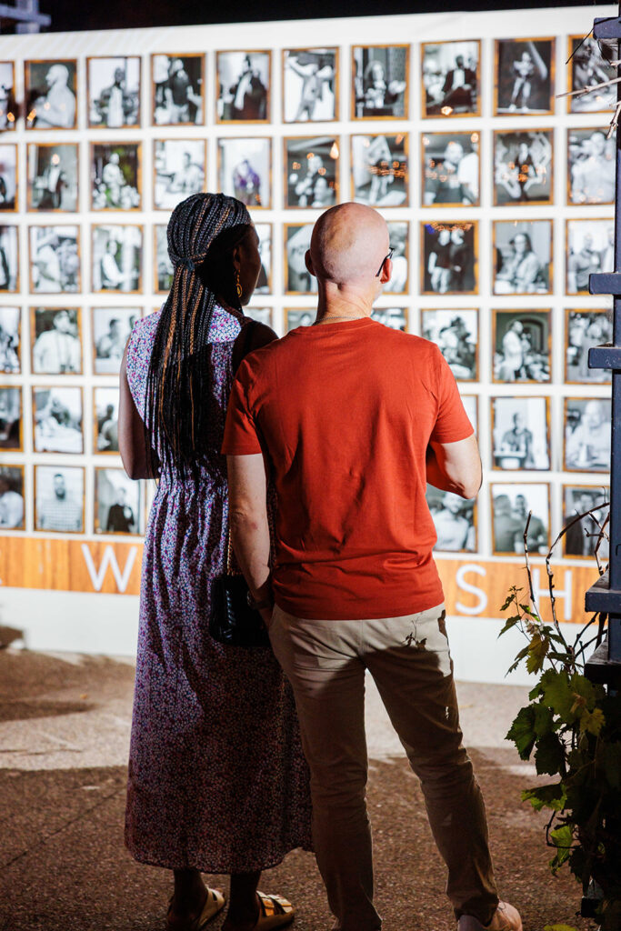 Attendees admire installation